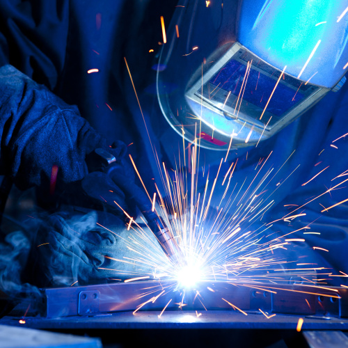 Welder erecting technical steel